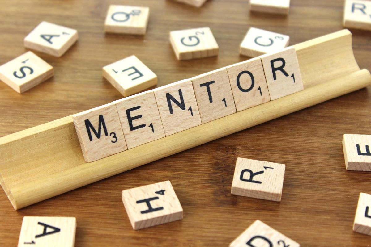 Mentorship spelled with game board letters